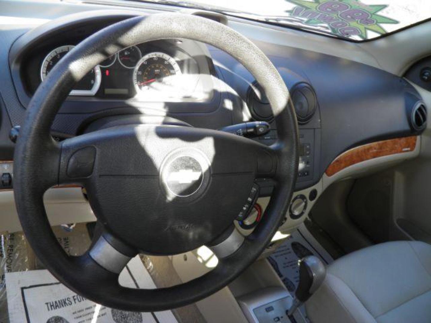 2007 Red /Neutral Cloth Seats Chevrolet Aveo LS 4-Door (KL1TD56627B) with an 1.6L I4 engine, AT transmission, located at 15520 McMullen Hwy SW, Belair, MD, 21502, (301) 729-3700, 39.581375, -78.846451 - Photo#2