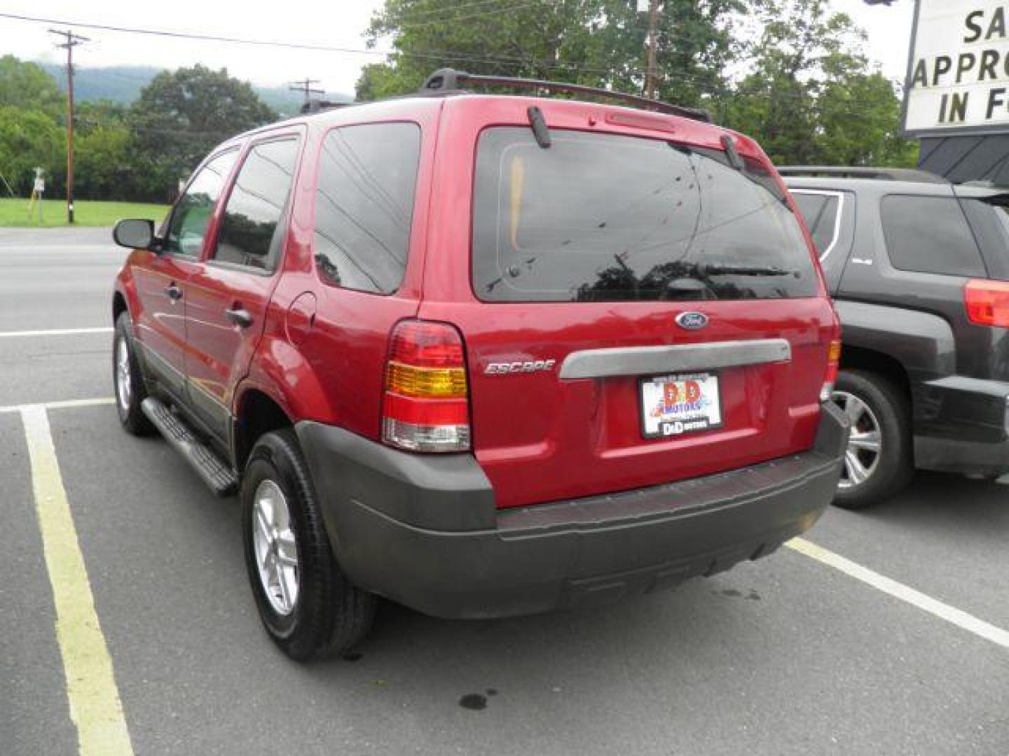 2007 Red Ford Escape XLS (1FMYU02Z47K) with an 2.3L I4 engine, AT transmission, located at 15520 McMullen Hwy SW, Belair, MD, 21502, (301) 729-3700, 39.581375, -78.846451 - Photo#5