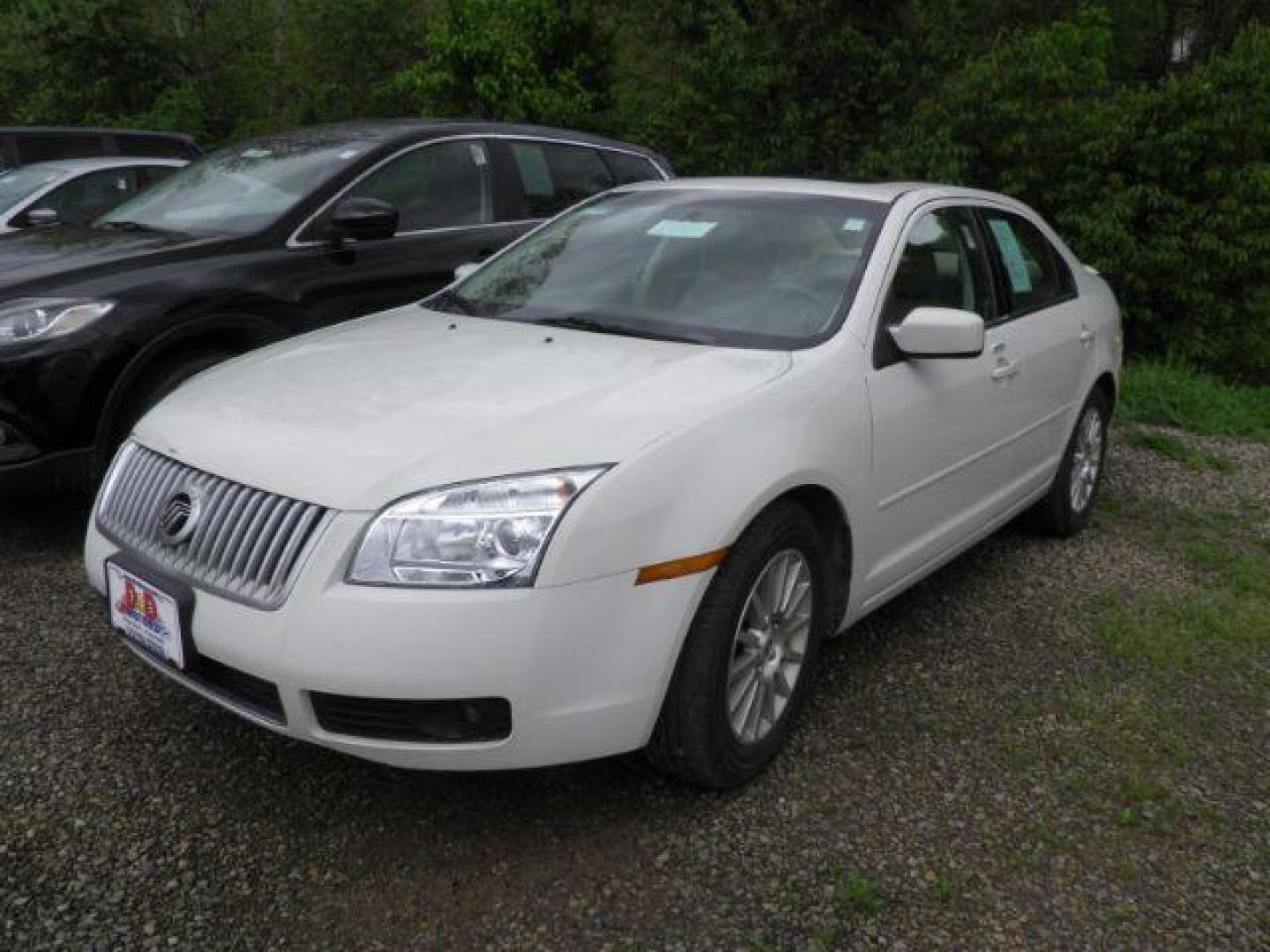2009 White Mercury Milan V6 Premier (3MEHM08169R) with an 3.0L V6 engine, AT transmission, located at 19521 New George's Creek Rd SW, Barton, MD, 21521, (301) 463-2404, 39.524323, -79.017906 - Photo#0