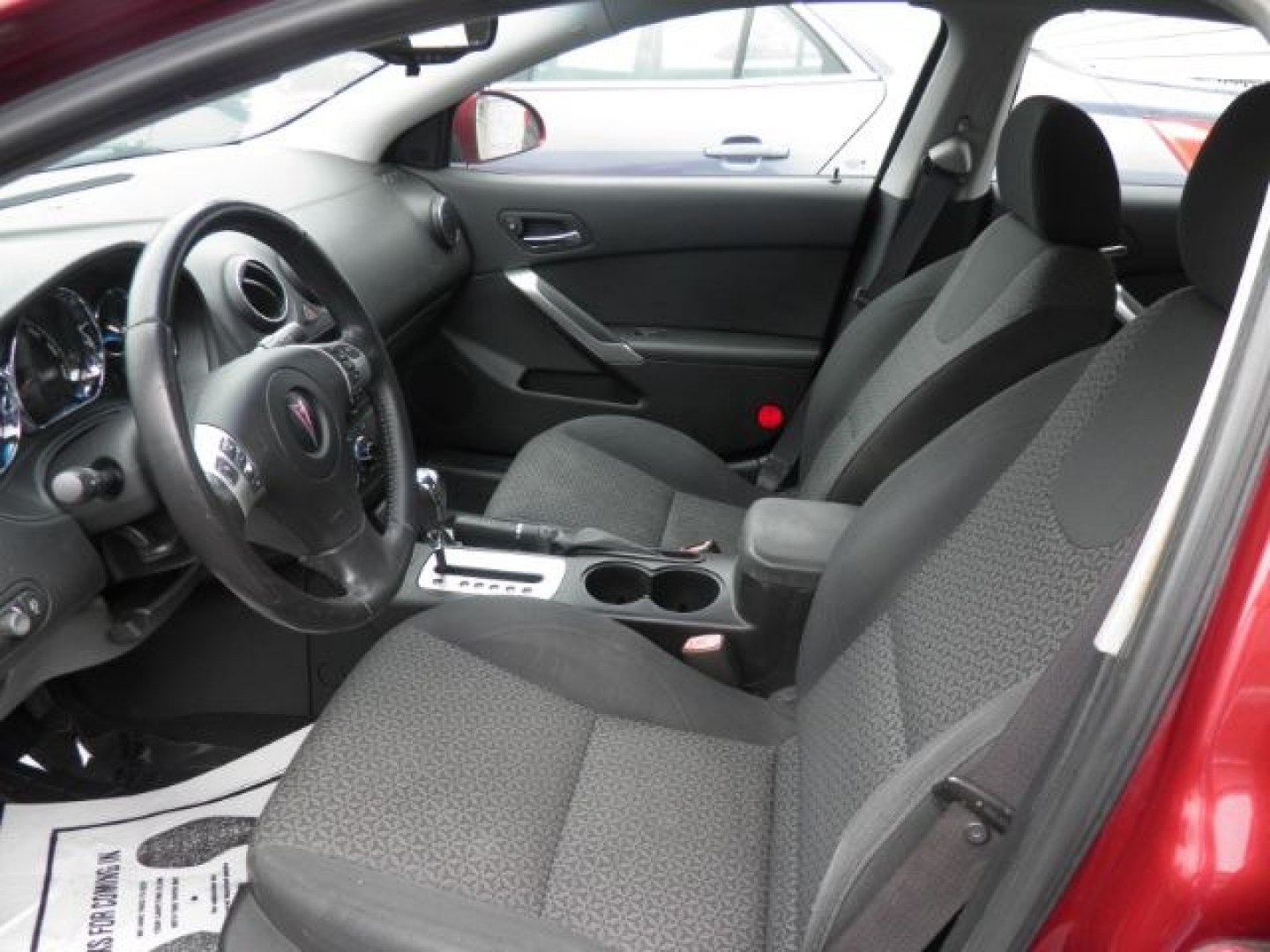 2009 RED Pontiac G6 Sedan (1G2ZJ57K794) with an 3.5L V6 OHV 12V engine, AT transmission, located at 15520 McMullen Hwy SW, Belair, MD, 21502, (301) 729-3700, 39.581375, -78.846451- Photo#1