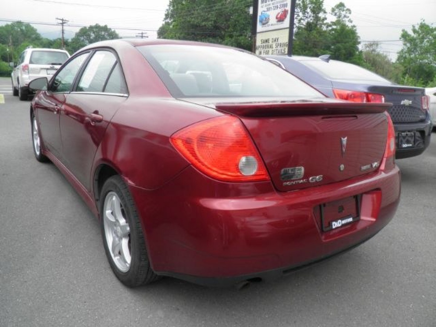 2009 RED Pontiac G6 Sedan (1G2ZJ57K794) with an 3.5L V6 OHV 12V engine, AT transmission, located at 15520 McMullen Hwy SW, Belair, MD, 21502, (301) 729-3700, 39.581375, -78.846451- Photo#4