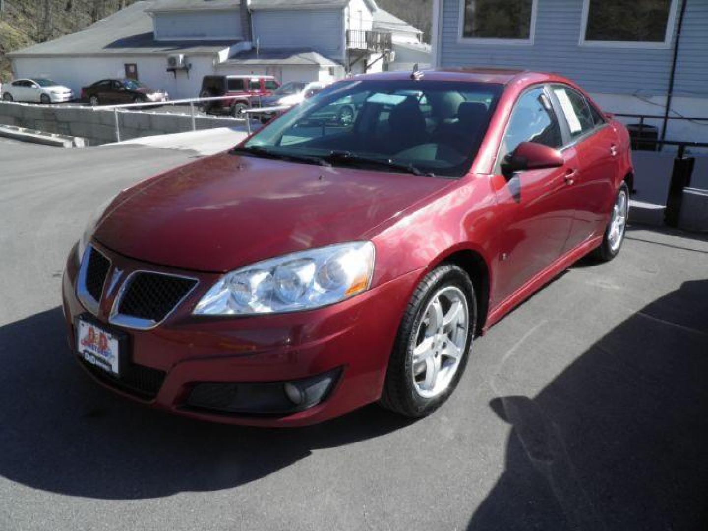 2009 RED Pontiac G6 Sedan (1G2ZJ57K794) with an 3.5L V6 OHV 12V engine, AT transmission, located at 15520 McMullen Hwy SW, Belair, MD, 21502, (301) 729-3700, 39.581375, -78.846451 - Photo#0