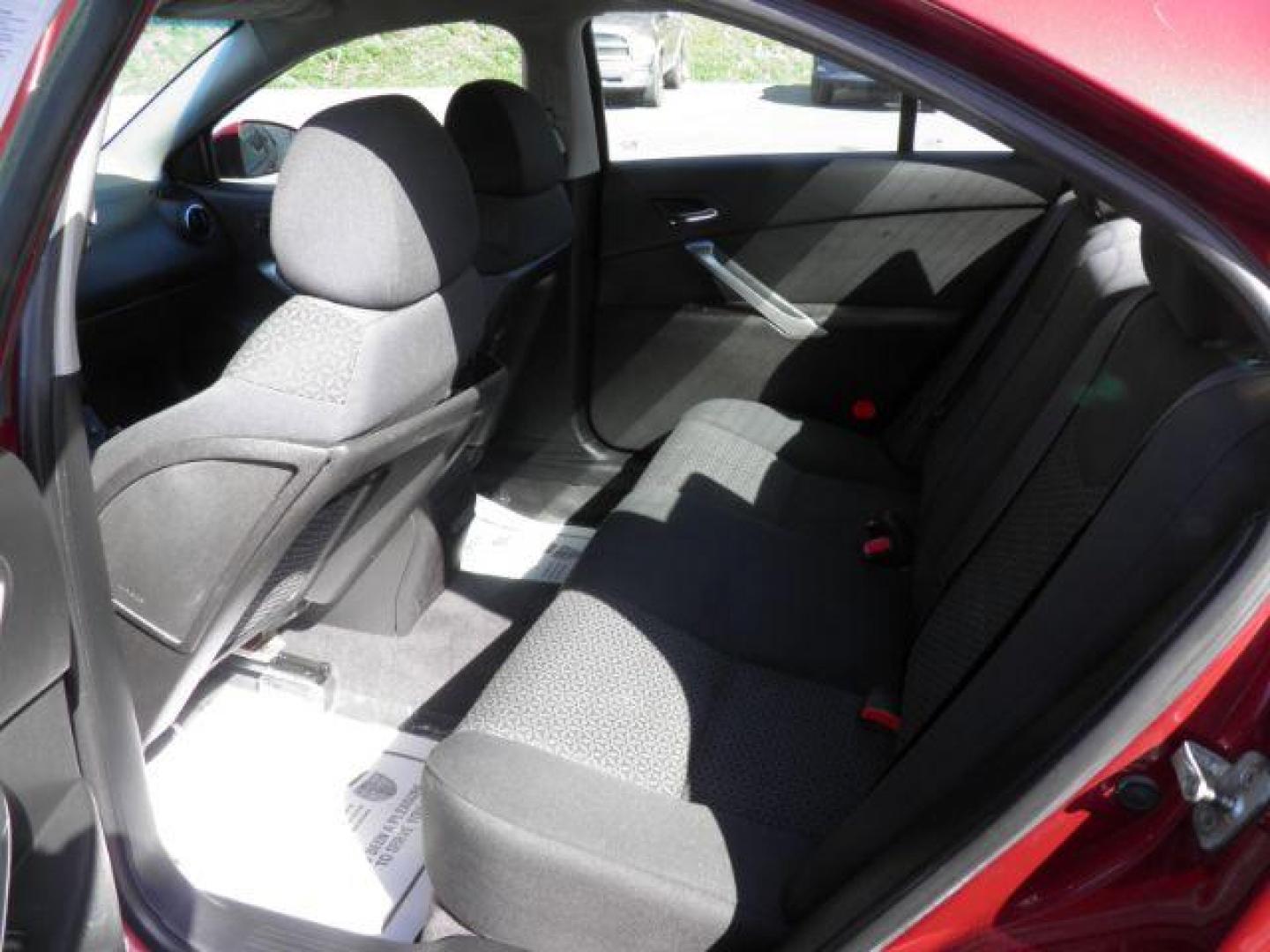 2009 RED Pontiac G6 Sedan (1G2ZJ57K794) with an 3.5L V6 OHV 12V engine, AT transmission, located at 15520 McMullen Hwy SW, Belair, MD, 21502, (301) 729-3700, 39.581375, -78.846451 - Photo#3