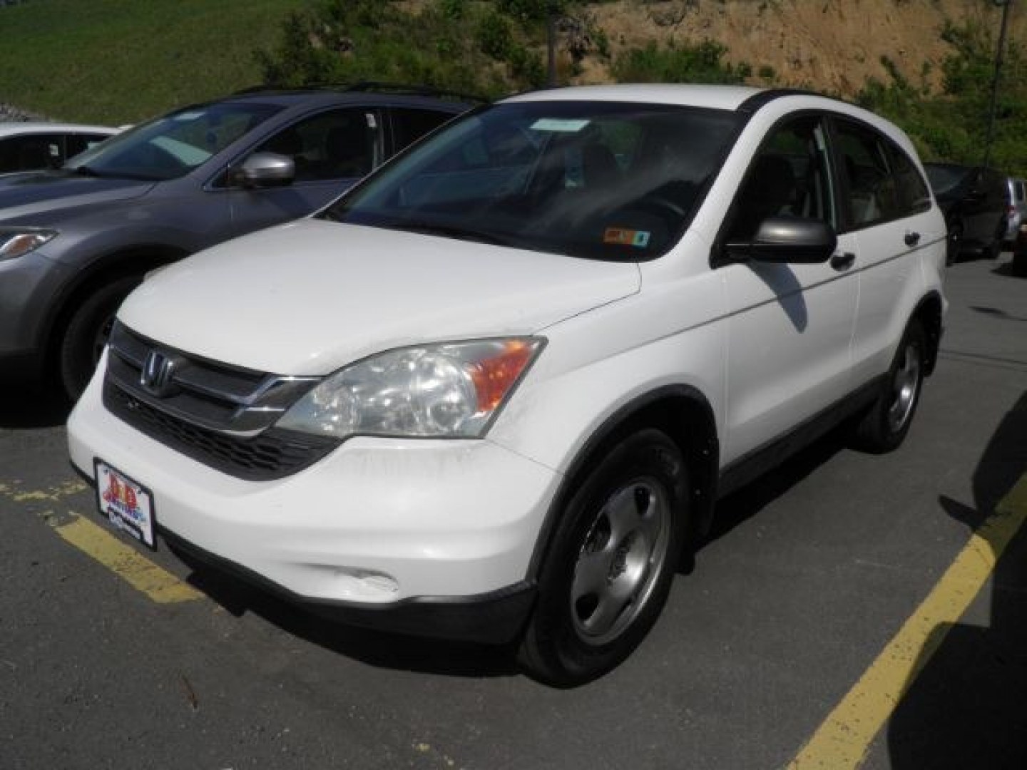 2010 WHITE Honda CR-V LX 4WD 5-Speed AT (5J6RE4H32AL) with an 2.4L L4 engine, AT transmission, located at 15520 McMullen Hwy SW, Belair, MD, 21502, (301) 729-3700, 39.581375, -78.846451- Photo#0