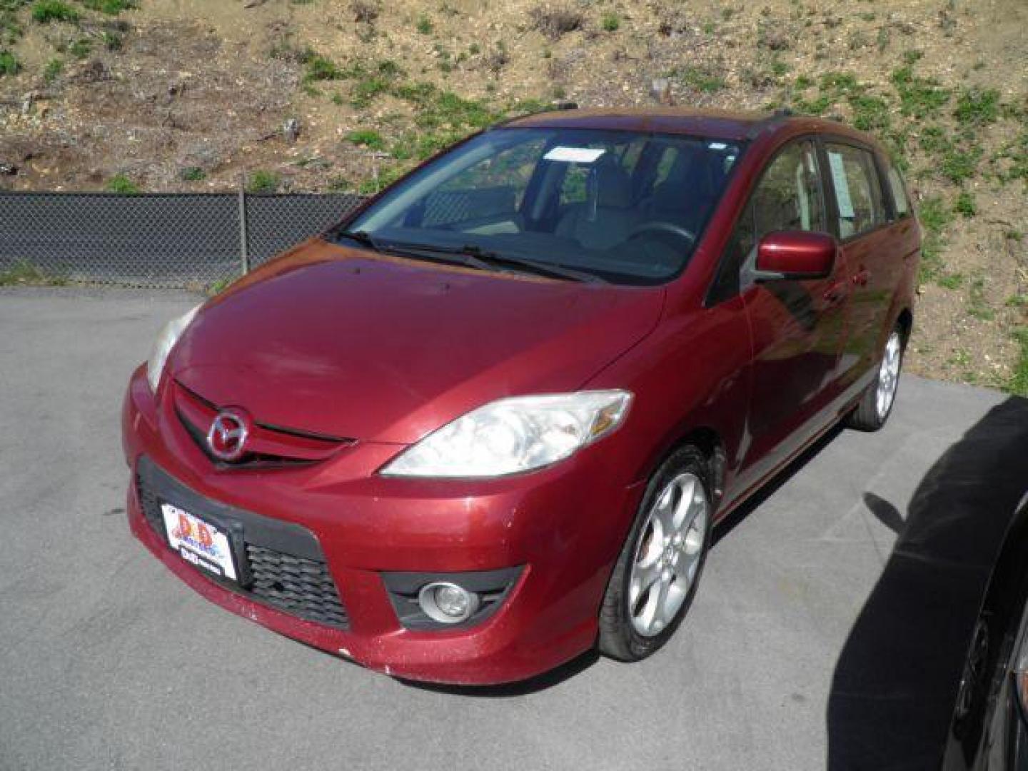 2010 RED Mazda MAZDA5 Touring (JM1CR2WL8A0) with an 2.3l L4 engine, 5SP transmission, located at 19521 New George's Creek Rd SW, Barton, MD, 21521, (301) 463-2404, 39.524323, -79.017906 - Photo#0