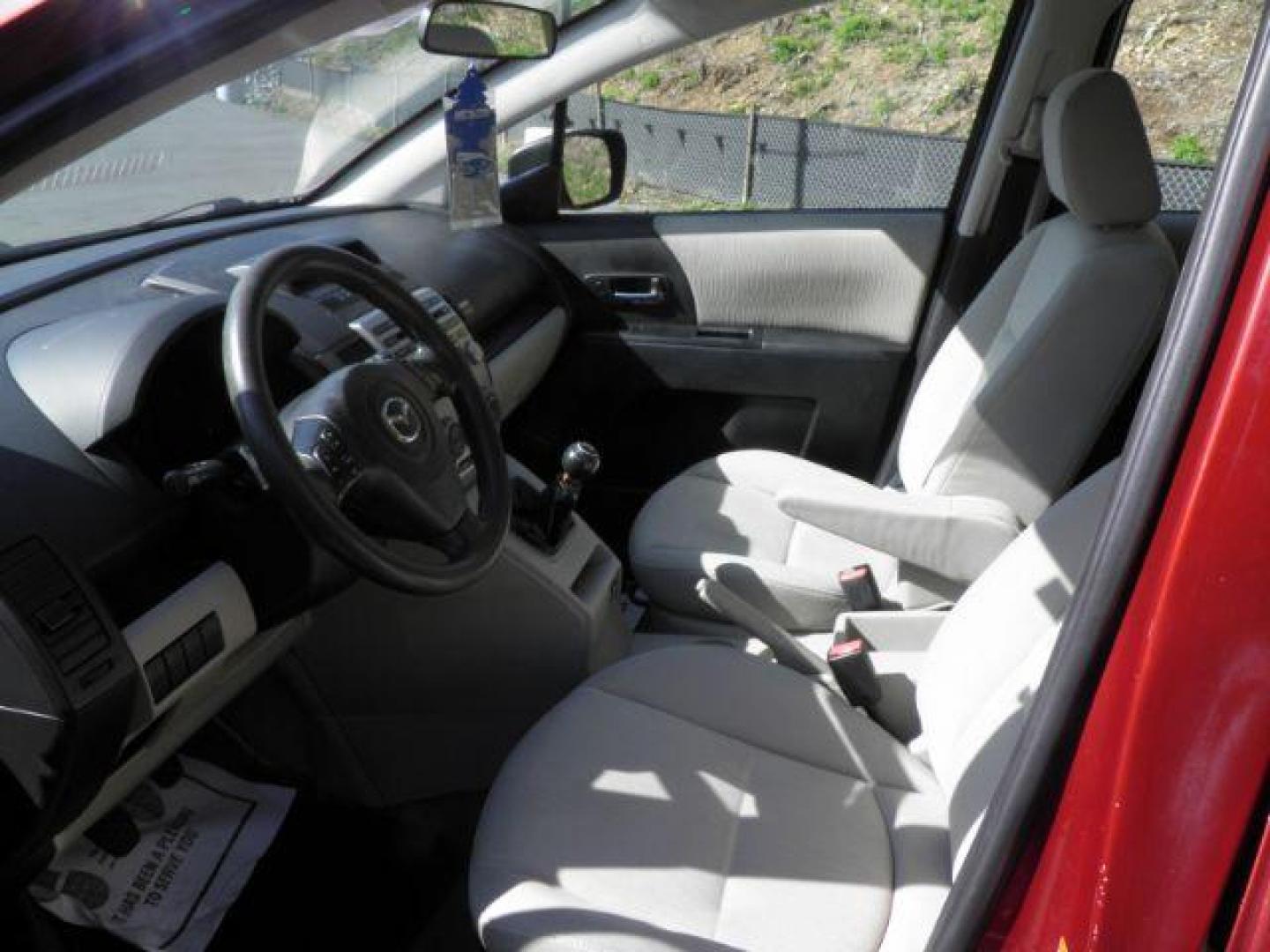 2010 RED Mazda MAZDA5 Touring (JM1CR2WL8A0) with an 2.3l L4 engine, 5SP transmission, located at 19521 New George's Creek Rd SW, Barton, MD, 21521, (301) 463-2404, 39.524323, -79.017906 - Photo#1