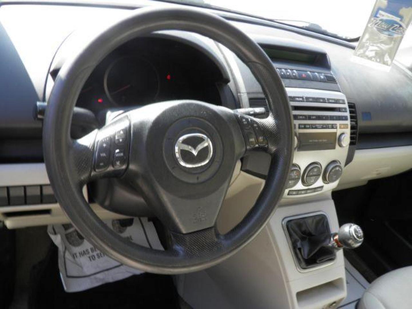 2010 RED Mazda MAZDA5 Touring (JM1CR2WL8A0) with an 2.3l L4 engine, 5SP transmission, located at 19521 New George's Creek Rd SW, Barton, MD, 21521, (301) 463-2404, 39.524323, -79.017906 - Photo#2