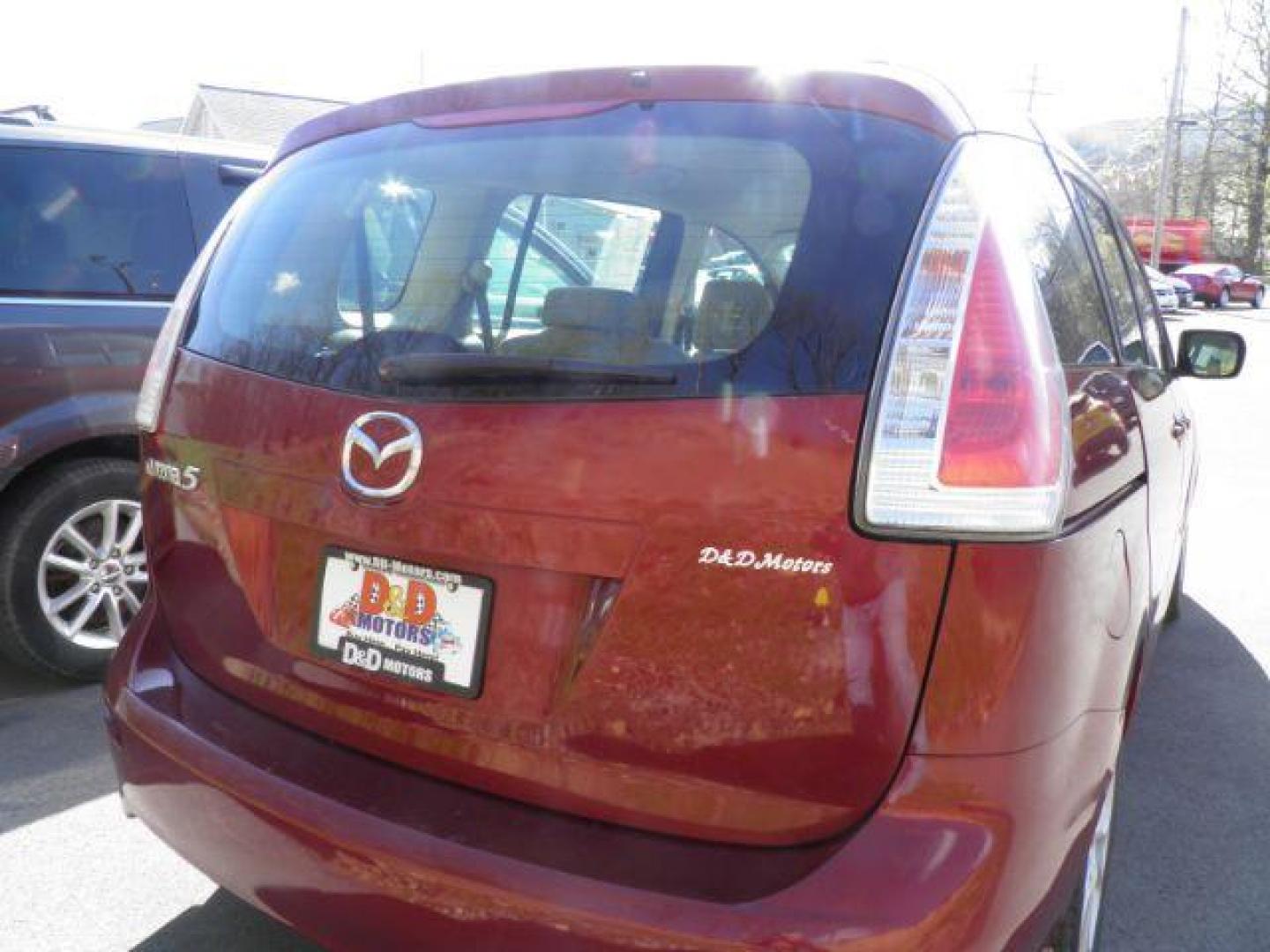 2010 RED Mazda MAZDA5 Touring (JM1CR2WL8A0) with an 2.3l L4 engine, 5SP transmission, located at 19521 New George's Creek Rd SW, Barton, MD, 21521, (301) 463-2404, 39.524323, -79.017906 - Photo#5