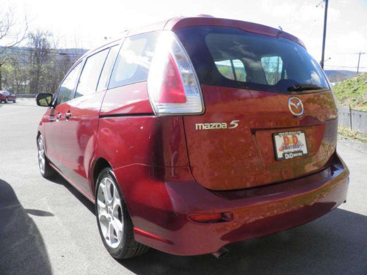 2010 RED Mazda MAZDA5 Touring (JM1CR2WL8A0) with an 2.3l L4 engine, 5SP transmission, located at 19521 New George's Creek Rd SW, Barton, MD, 21521, (301) 463-2404, 39.524323, -79.017906 - Photo#6