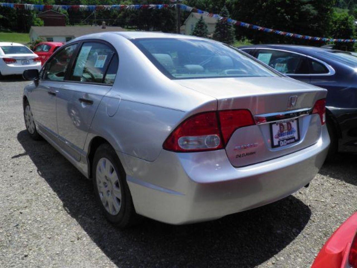 2011 Silver Honda Civic DX-VP (2HGFA1F37BH) with an 1.8L I4 engine, AT transmission, located at 19521 New George's Creek Rd SW, Barton, MD, 21521, (301) 463-2404, 39.524323, -79.017906- Photo#4