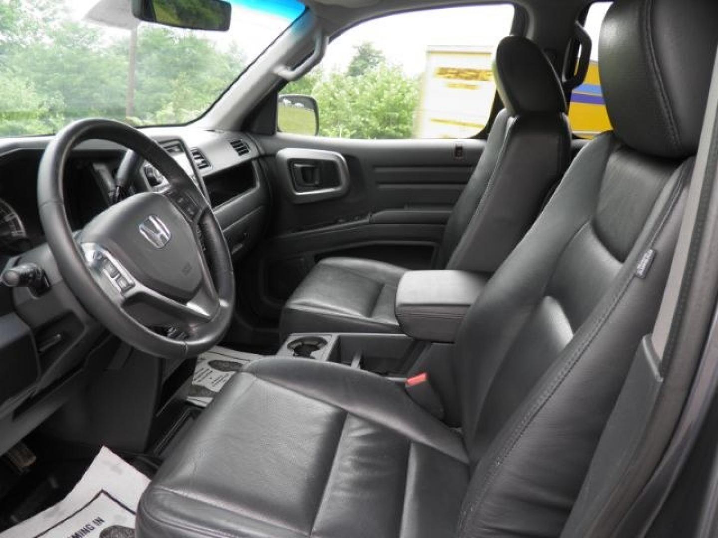 2011 Gray Honda Ridgeline RTL (5FPYK1F51BB) with an 3.5L V6 engine, AT transmission, located at 15520 McMullen Hwy SW, Belair, MD, 21502, (301) 729-3700, 39.581375, -78.846451- Photo#1