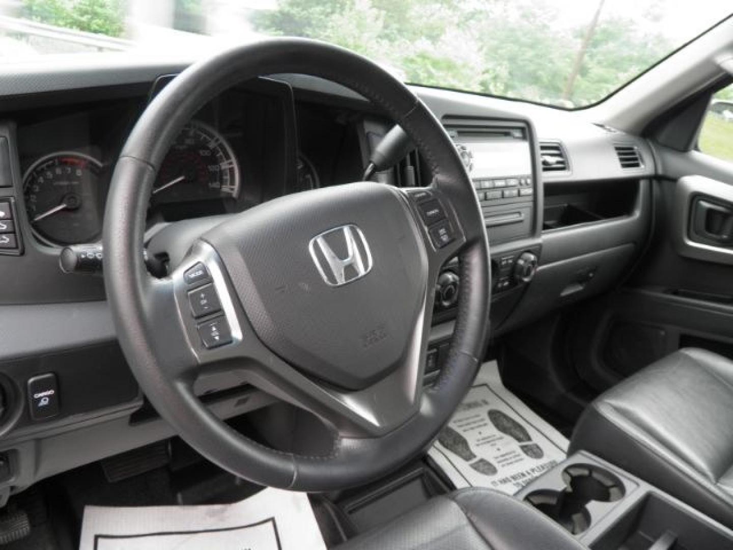 2011 Gray Honda Ridgeline RTL (5FPYK1F51BB) with an 3.5L V6 engine, AT transmission, located at 15520 McMullen Hwy SW, Belair, MD, 21502, (301) 729-3700, 39.581375, -78.846451- Photo#2