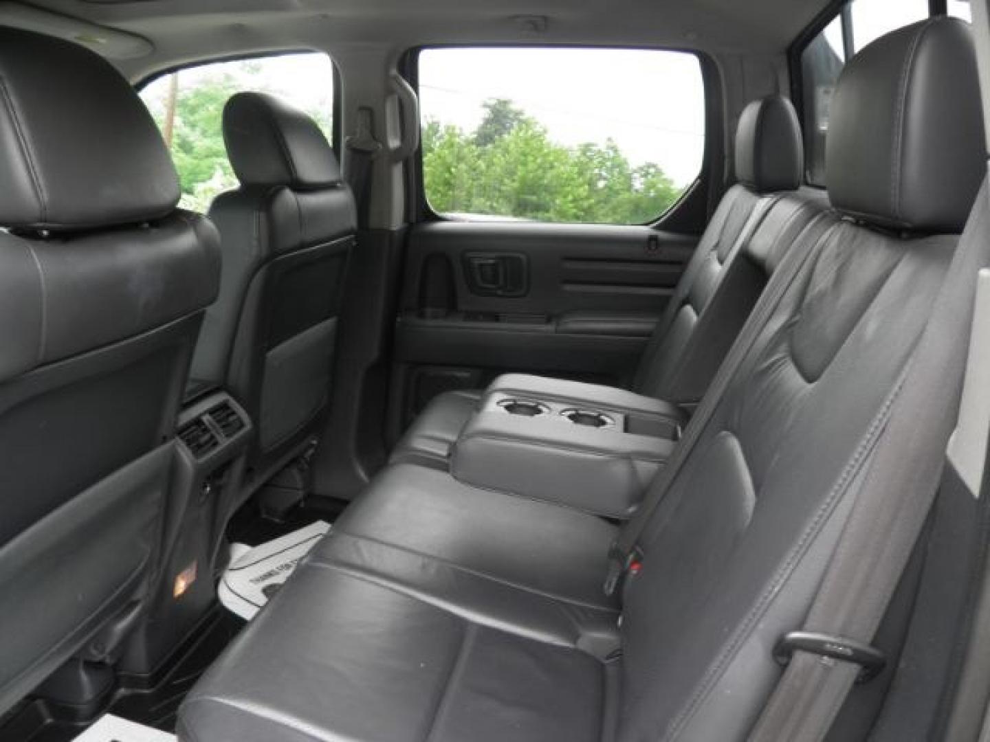 2011 Gray Honda Ridgeline RTL (5FPYK1F51BB) with an 3.5L V6 engine, AT transmission, located at 15520 McMullen Hwy SW, Belair, MD, 21502, (301) 729-3700, 39.581375, -78.846451- Photo#3