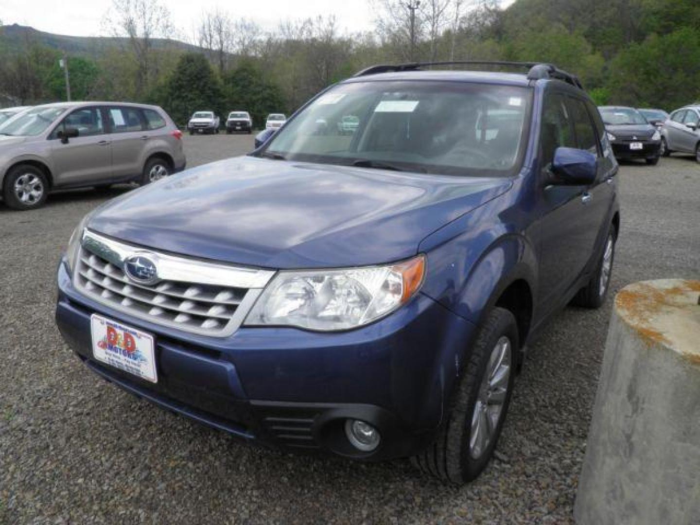 2011 BLUE Subaru Forester 2.5X Limited (JF2SHAEC0BH) with an 2.5 L4 engine, AT transmission, located at 19521 New George's Creek Rd SW, Barton, MD, 21521, (301) 463-2404, 39.524323, -79.017906 - Photo#0