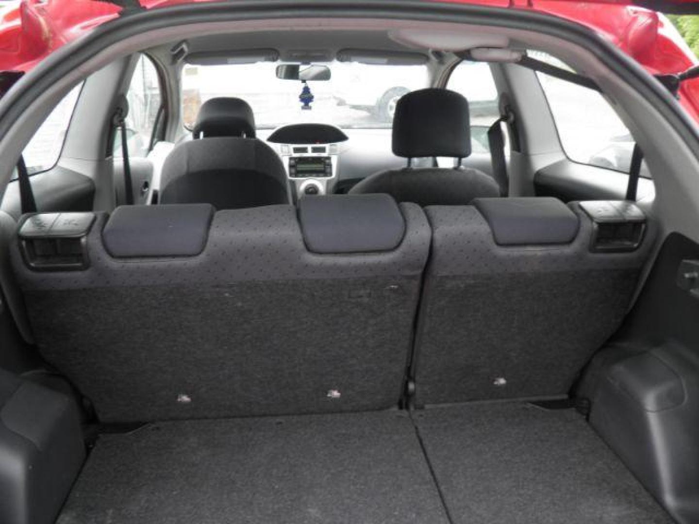 2011 Red Toyota Yaris BASE (JTDJT4K30B5) with an 2.4L I4 engine, AT transmission, located at 19521 New George's Creek Rd SW, Barton, MD, 21521, (301) 463-2404, 39.524323, -79.017906 - Photo#4