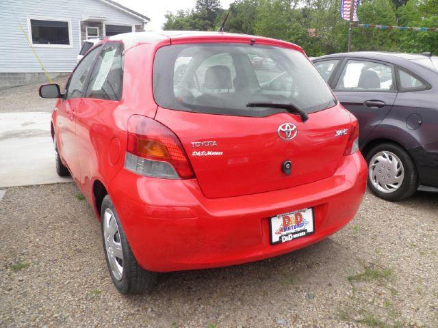 2011 Red Toyota Yaris BASE (JTDJT4K30B5) with an 2.4L I4 engine, AT transmission, located at 19521 New George's Creek Rd SW, Barton, MD, 21521, (301) 463-2404, 39.524323, -79.017906 - Photo#5