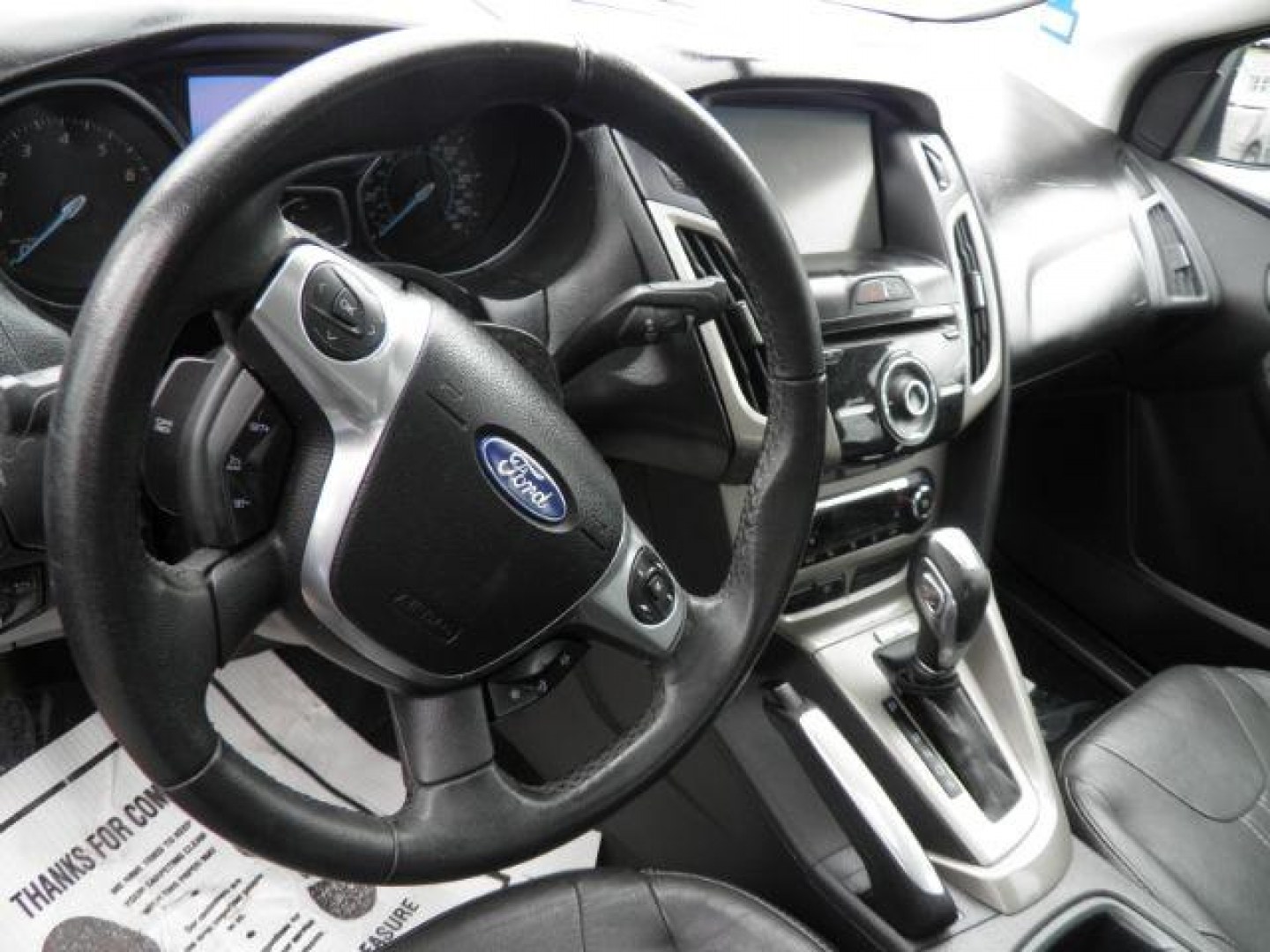 2012 Black Ford Focus SEL Sedan (1FAHP3H2XCL) with an 2.0L I4 engine, AT transmission, located at 19521 New George's Creek Rd SW, Barton, MD, 21521, (301) 463-2404, 39.524323, -79.017906 - Photo#2