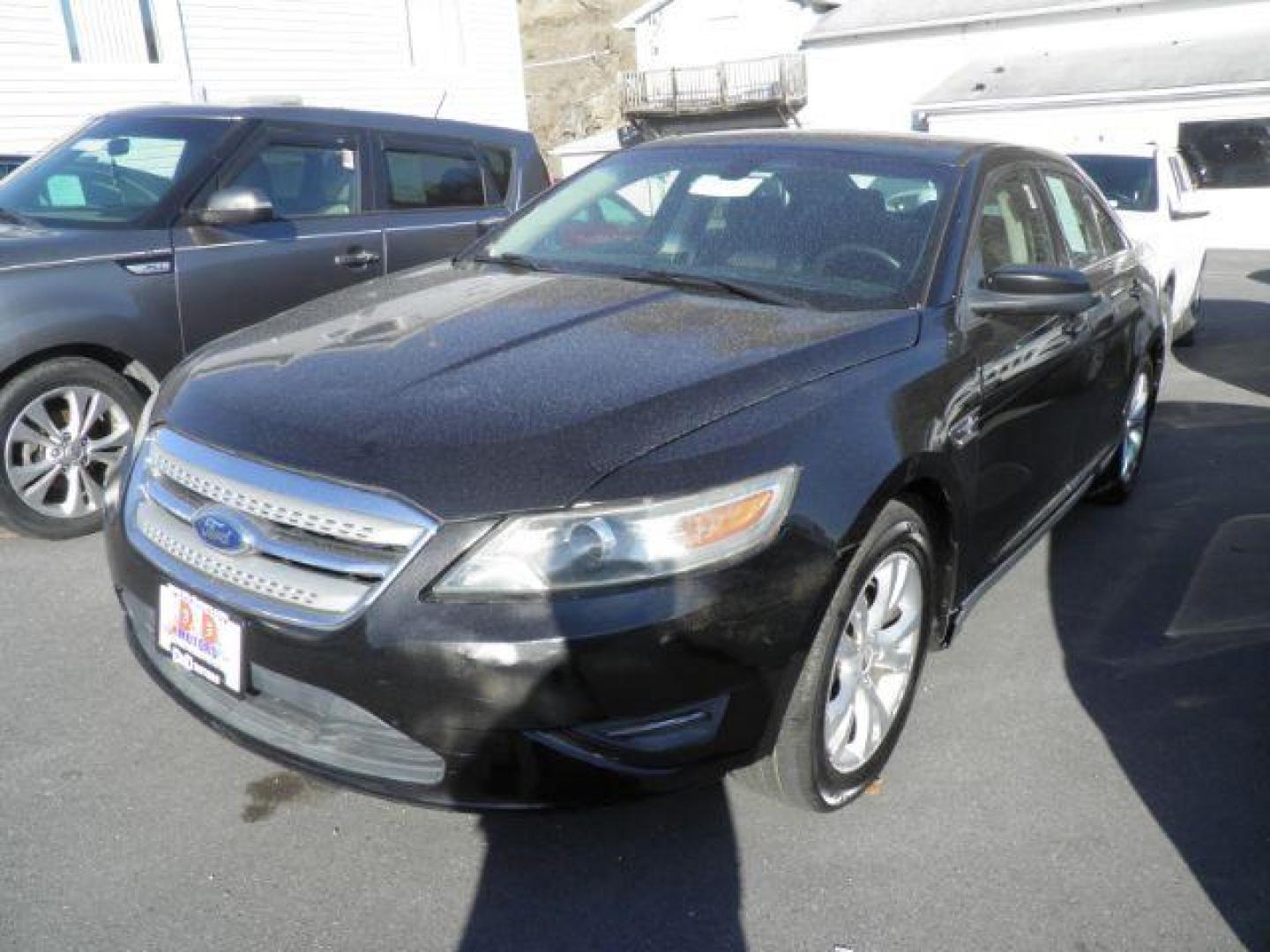 2012 Ebony Black Ford Taurus SEL FWD (1FAHP2EW8CG) with an 3.5L V6 DOHC 24V engine, AT transmission, located at 15520 McMullen Hwy SW, Belair, MD, 21502, (301) 729-3700, 39.581375, -78.846451 - Photo#0
