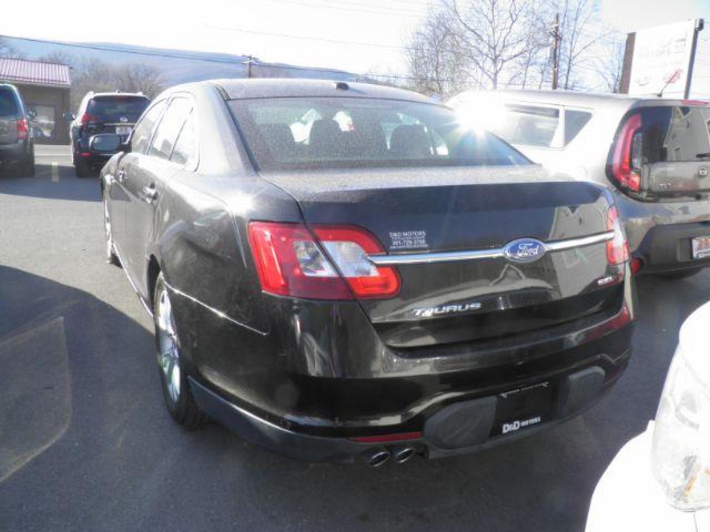 2012 Ebony Black Ford Taurus SEL FWD (1FAHP2EW8CG) with an 3.5L V6 DOHC 24V engine, AT transmission, located at 15520 McMullen Hwy SW, Belair, MD, 21502, (301) 729-3700, 39.581375, -78.846451 - Photo#4