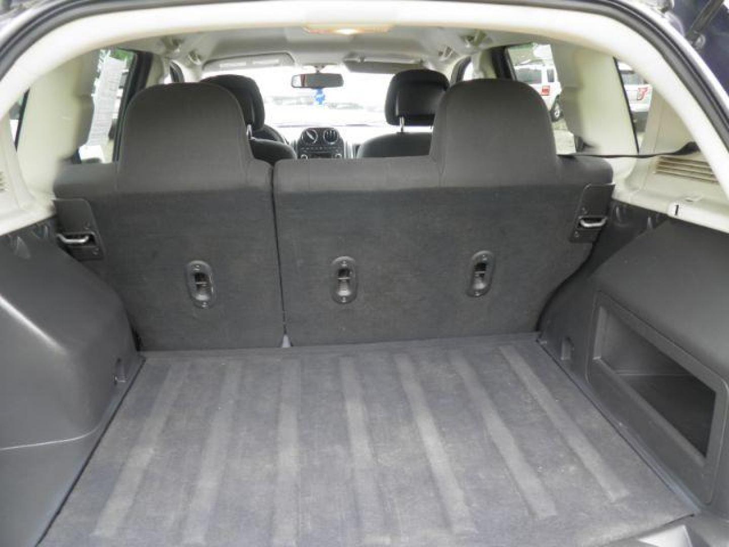 2012 Blue Jeep Compass Sport 4WD (1C4NJDBB2CD) with an 2.4L I4 engine, AT transmission, located at 19521 New George's Creek Rd SW, Barton, MD, 21521, (301) 463-2404, 39.524323, -79.017906 - Photo#4