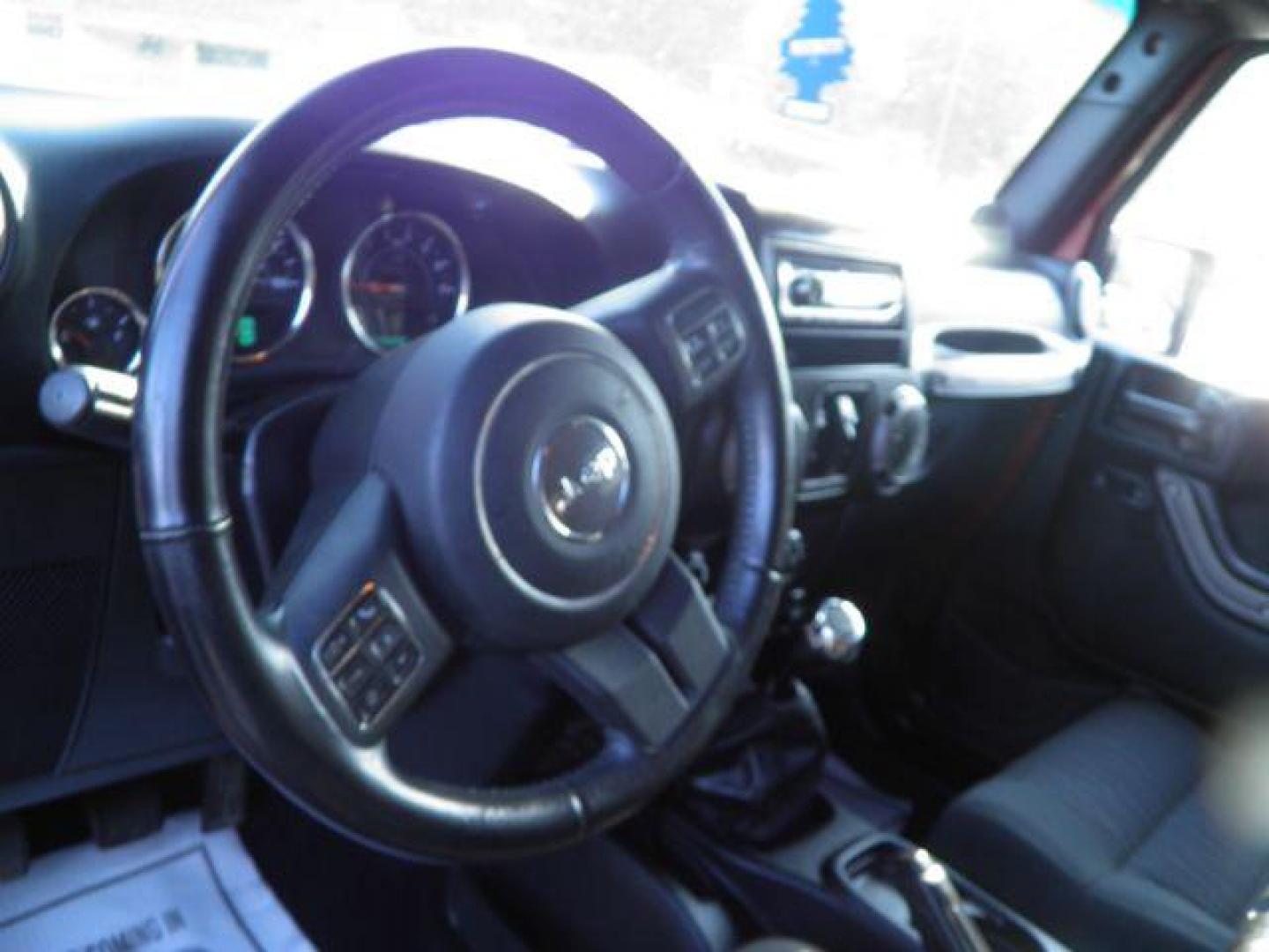 2012 RED Jeep Wrangler Unlimited Sport 4WD (1C4BJWDG6CL) with an 3.6L V6 engine, 6SP transmission, located at 19521 New George's Creek Rd SW, Barton, MD, 21521, (301) 463-2404, 39.524323, -79.017906 - Photo#2