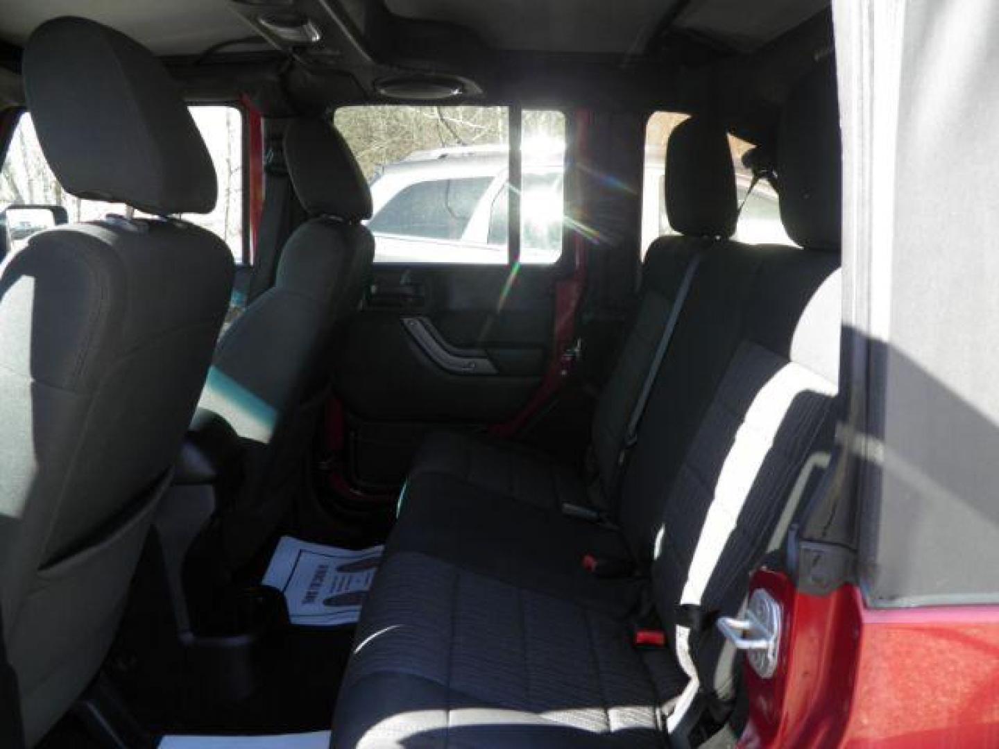 2012 RED Jeep Wrangler Unlimited Sport 4WD (1C4BJWDG6CL) with an 3.6L V6 engine, 6SP transmission, located at 19521 New George's Creek Rd SW, Barton, MD, 21521, (301) 463-2404, 39.524323, -79.017906 - Photo#3