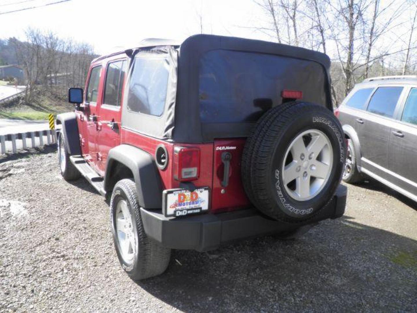 2012 RED Jeep Wrangler Unlimited Sport 4WD (1C4BJWDG6CL) with an 3.6L V6 engine, 6SP transmission, located at 19521 New George's Creek Rd SW, Barton, MD, 21521, (301) 463-2404, 39.524323, -79.017906 - Photo#5
