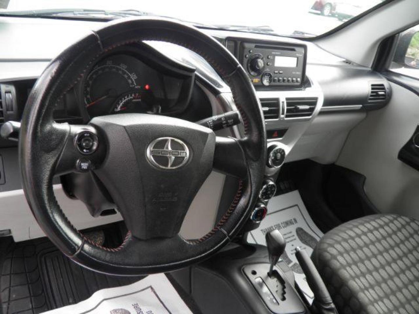 2012 Orange /Deco Black Cloth Interior Scion iQ 3-Door Hatchback AT (JTNJJXB01CJ) with an 1.3L I4 engine, AT transmission, located at 15520 McMullen Hwy SW, Belair, MD, 21502, (301) 729-3700, 39.581375, -78.846451 - Photo#2