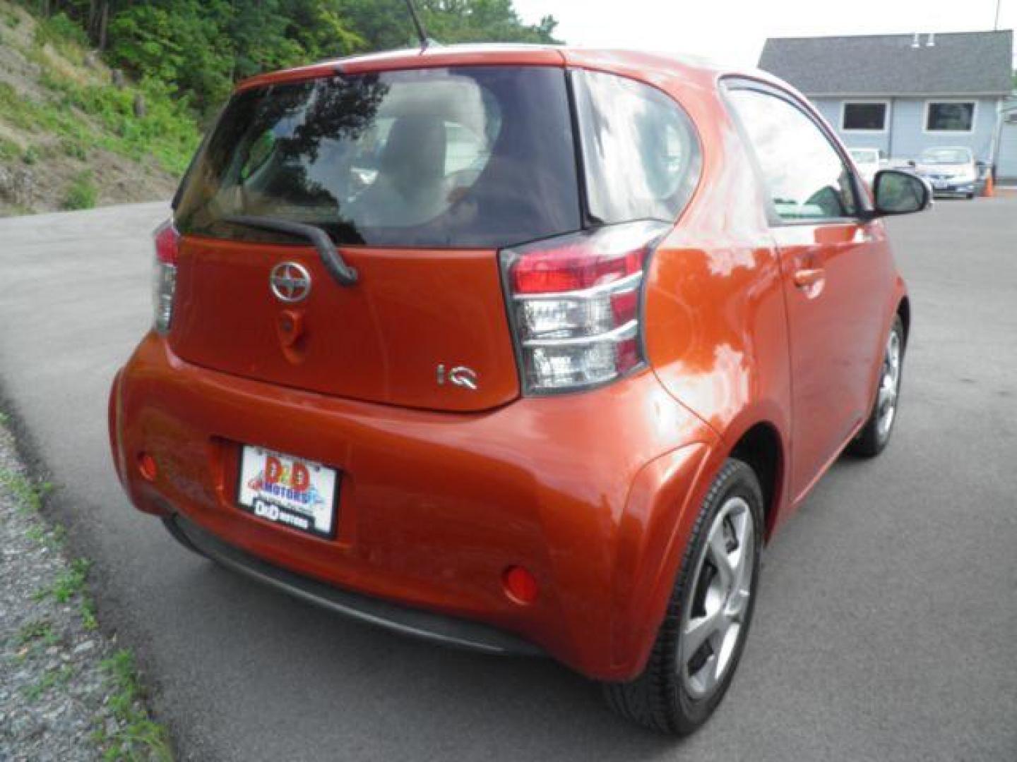 2012 Orange /Deco Black Cloth Interior Scion iQ 3-Door Hatchback AT (JTNJJXB01CJ) with an 1.3L I4 engine, AT transmission, located at 15520 McMullen Hwy SW, Belair, MD, 21502, (301) 729-3700, 39.581375, -78.846451 - Photo#5