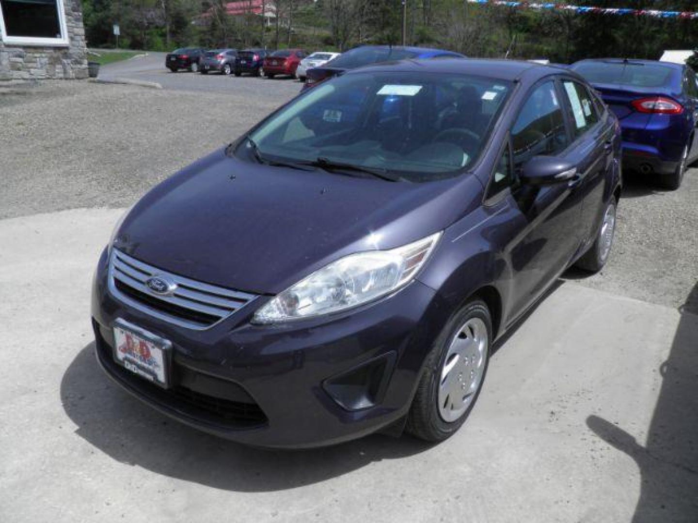 2013 GRAY Ford Fiesta SE Sedan (3FADP4BJ1DM) with an 1.6L L4 engine, AT transmission, located at 19521 New George's Creek Rd SW, Barton, MD, 21521, (301) 463-2404, 39.524323, -79.017906 - Photo#0