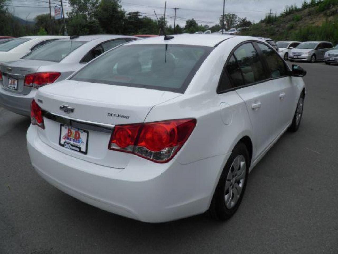 2014 White Chevrolet Cruze LS Auto (1G1PA5SG4E7) with an 1.8L I4 engine, AT transmission, located at 15520 McMullen Hwy SW, Belair, MD, 21502, (301) 729-3700, 39.581375, -78.846451 - Photo#4