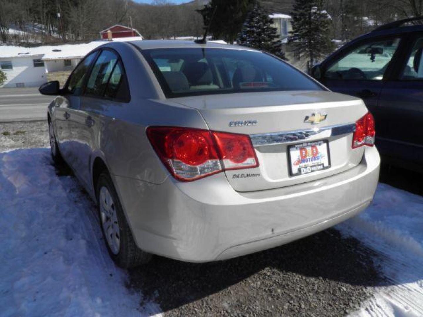 2014 Gold Chevrolet Cruze LS Auto (1G1PA5SG3E7) with an 1.8L I4 engine, AT transmission, located at 19521 New George's Creek Rd SW, Barton, MD, 21521, (301) 463-2404, 39.524323, -79.017906 - Photo#4