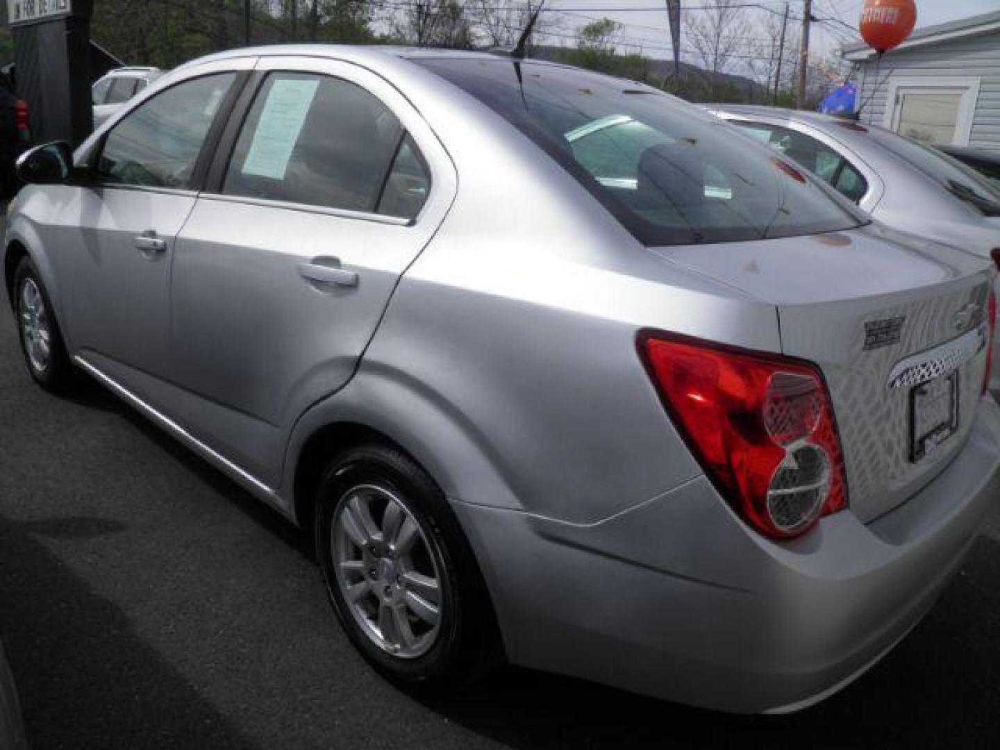 2014 Silver Chevrolet Sonic LT Auto Sedan (1G1JC5SH2E4) with an 1.8L I4 engine, AT transmission, located at 19521 New George's Creek Rd SW, Barton, MD, 21521, (301) 463-2404, 39.524323, -79.017906 - Photo#3