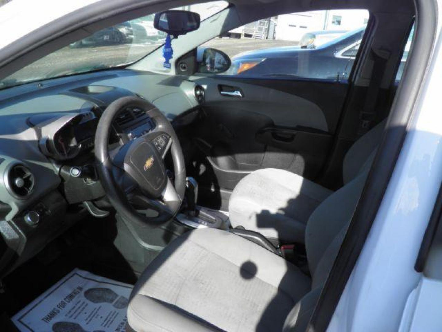 2014 Summit White Chevrolet Sonic LS Auto 5-Door (1G1JA6SG9E4) with an 1.8L L4 DOHC 24V engine, 6-Speed Automatic transmission, located at 19521 New George's Creek Rd SW, Barton, MD, 21521, (301) 463-2404, 39.524323, -79.017906 - Photo#1