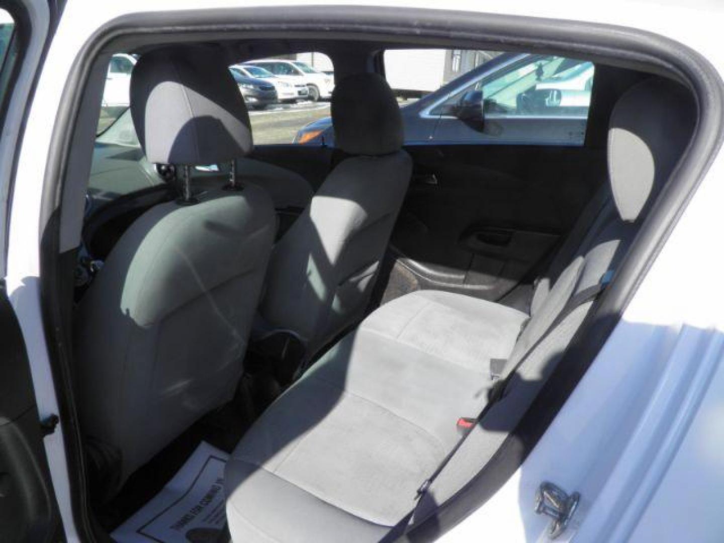 2014 Summit White Chevrolet Sonic LS Auto 5-Door (1G1JA6SG9E4) with an 1.8L L4 DOHC 24V engine, 6-Speed Automatic transmission, located at 19521 New George's Creek Rd SW, Barton, MD, 21521, (301) 463-2404, 39.524323, -79.017906 - Photo#3