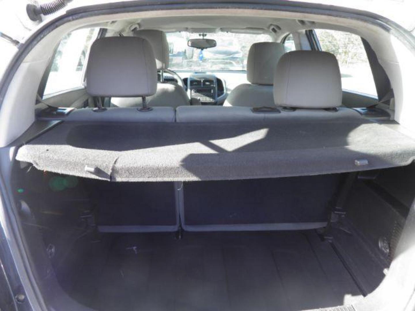 2014 Summit White Chevrolet Sonic LS Auto 5-Door (1G1JA6SG9E4) with an 1.8L L4 DOHC 24V engine, 6-Speed Automatic transmission, located at 19521 New George's Creek Rd SW, Barton, MD, 21521, (301) 463-2404, 39.524323, -79.017906 - Photo#4