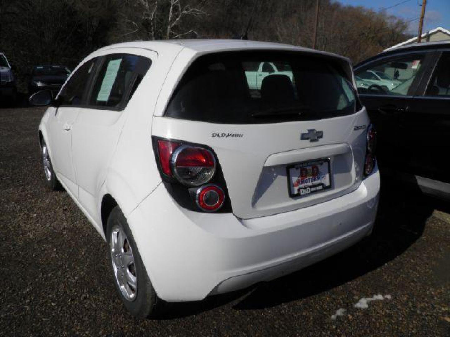 2014 Summit White Chevrolet Sonic LS Auto 5-Door (1G1JA6SG9E4) with an 1.8L L4 DOHC 24V engine, 6-Speed Automatic transmission, located at 19521 New George's Creek Rd SW, Barton, MD, 21521, (301) 463-2404, 39.524323, -79.017906 - Photo#5