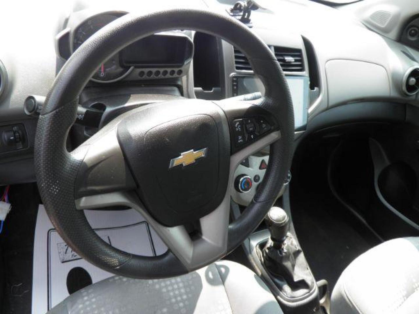 2014 Red Chevrolet Sonic LS Manual Sedan (1G1JB5SH5E4) with an 1.8L I4 engine, MAN transmission, located at 19521 New George's Creek Rd SW, Barton, MD, 21521, (301) 463-2404, 39.524323, -79.017906 - Photo#2