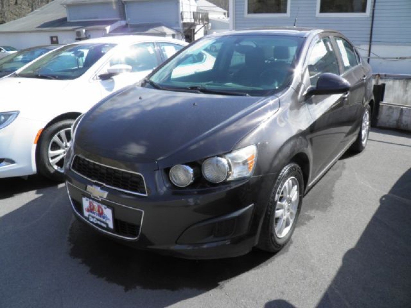 2014 Gray Chevrolet Sonic LT Auto Sedan (1G1JC5SH1E4) with an 1.8L I4 engine, AT transmission, located at 19521 New George's Creek Rd SW, Barton, MD, 21521, (301) 463-2404, 39.524323, -79.017906- Photo#0