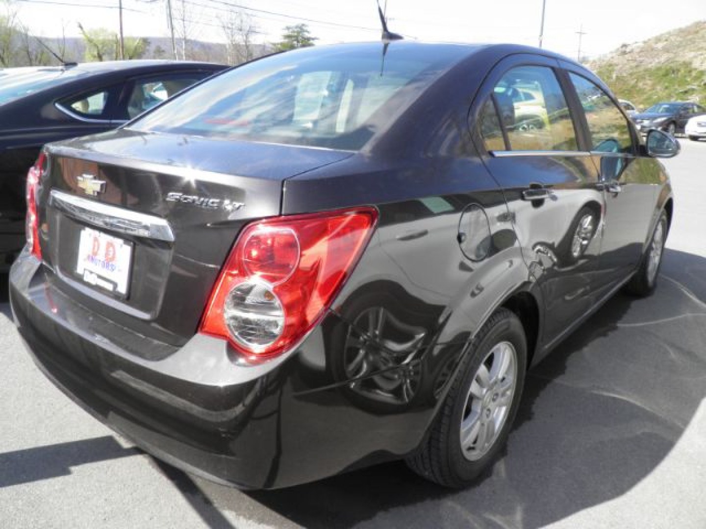2014 Gray Chevrolet Sonic LT Auto Sedan (1G1JC5SH1E4) with an 1.8L I4 engine, AT transmission, located at 19521 New George's Creek Rd SW, Barton, MD, 21521, (301) 463-2404, 39.524323, -79.017906- Photo#4