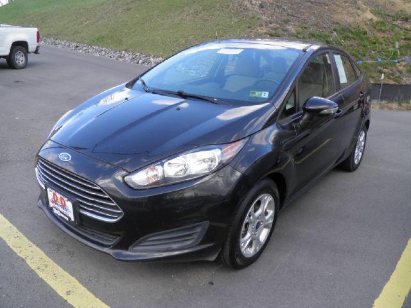 2014 Black Ford Fiesta SE Sedan (3FADP4BJ1EM) with an 1.6L I4 engine, AT transmission, located at 19521 New George's Creek Rd SW, Barton, MD, 21521, (301) 463-2404, 39.524323, -79.017906 - Photo#0