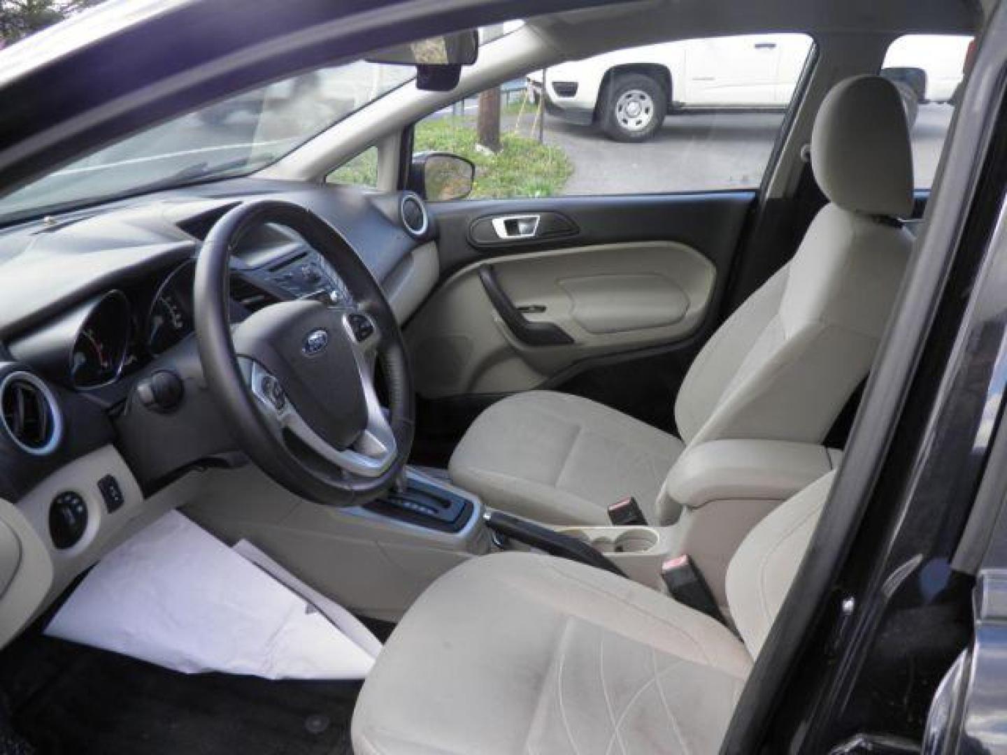 2014 Black Ford Fiesta SE Sedan (3FADP4BJ1EM) with an 1.6L I4 engine, AT transmission, located at 19521 New George's Creek Rd SW, Barton, MD, 21521, (301) 463-2404, 39.524323, -79.017906 - Photo#1