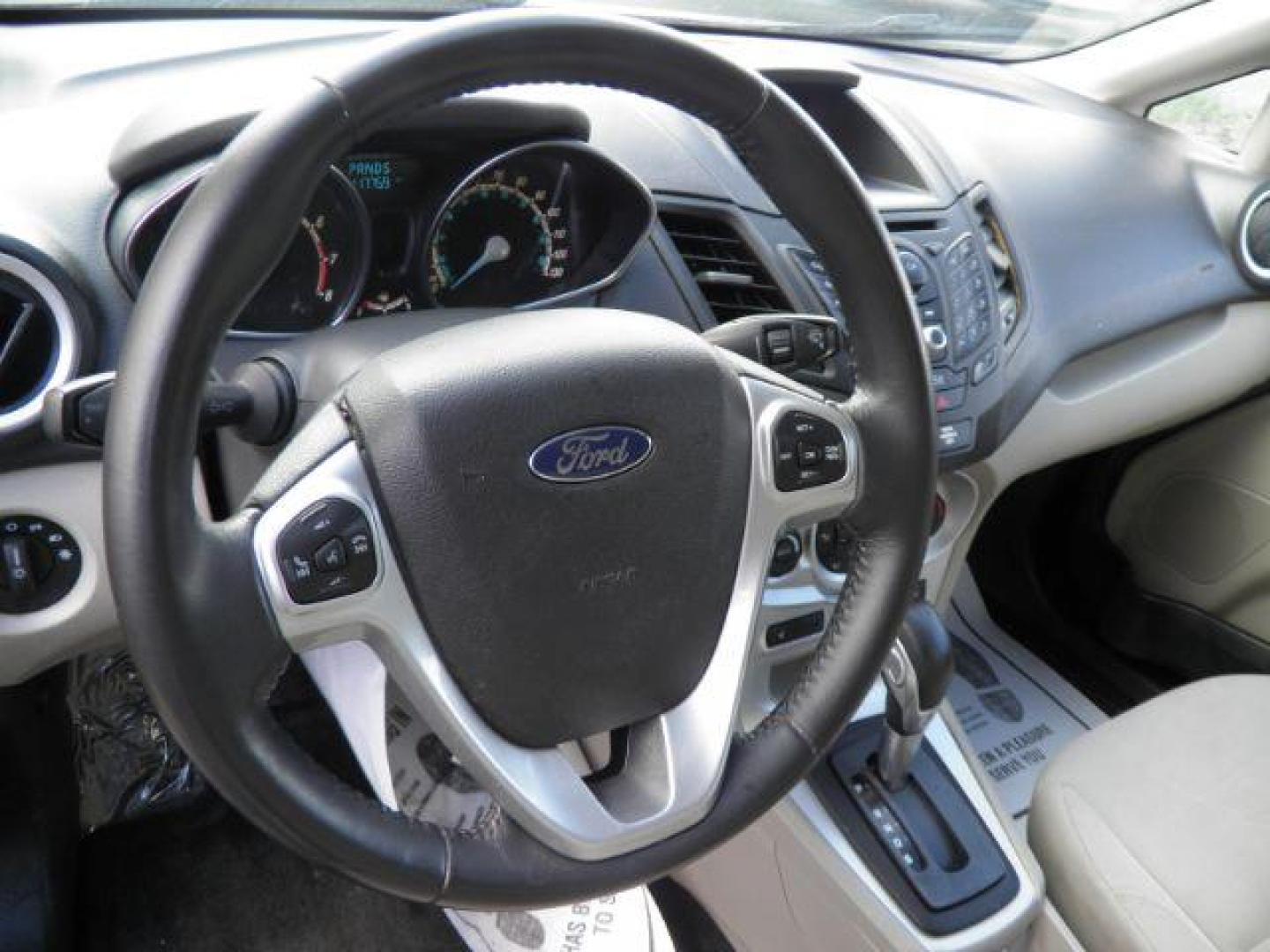 2014 Black Ford Fiesta SE Sedan (3FADP4BJ1EM) with an 1.6L I4 engine, AT transmission, located at 19521 New George's Creek Rd SW, Barton, MD, 21521, (301) 463-2404, 39.524323, -79.017906 - Photo#2