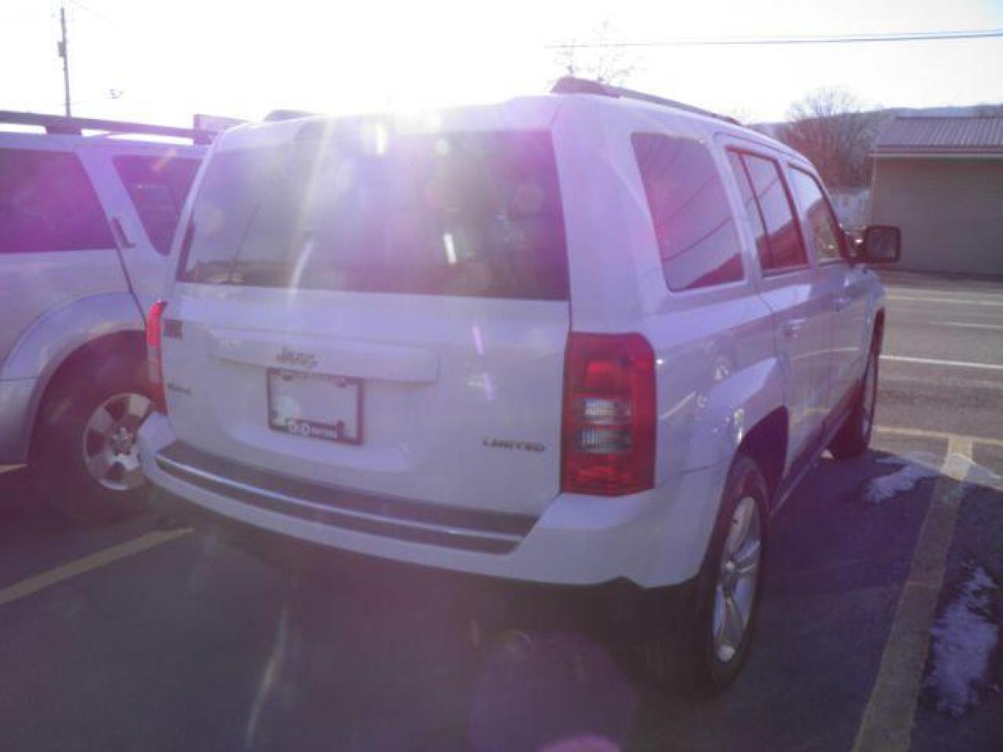 2014 WHITE Jeep Patriot Limited 4WD (1C4NJRCB2ED) with an 2.4L L4 engine, AT transmission, located at 19521 New George's Creek Rd SW, Barton, MD, 21521, (301) 463-2404, 39.524323, -79.017906 - Photo#5