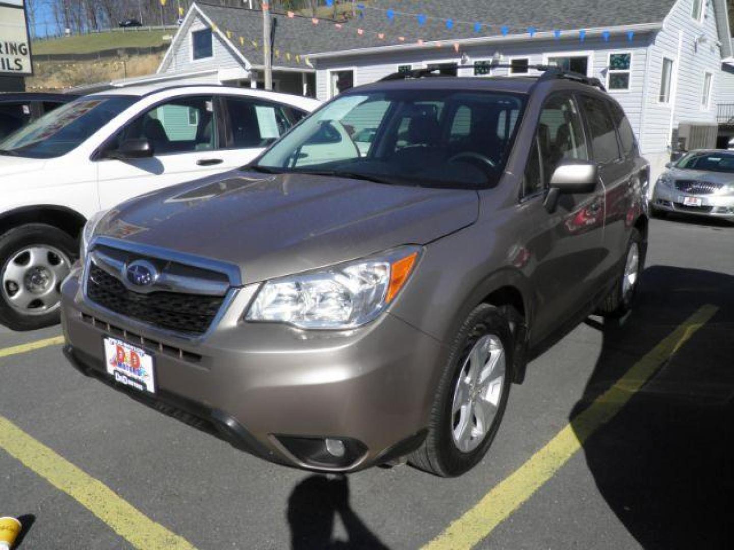 2014 GOLD Subaru Forester 2.5i Limited (JF2SJAHC7EH) with an 2.5 L4 engine, CVT transmission, located at 15520 McMullen Hwy SW, Belair, MD, 21502, (301) 729-3700, 39.581375, -78.846451 - Photo#0