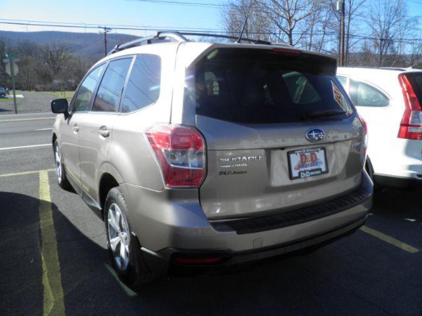 2014 GOLD Subaru Forester 2.5i Limited (JF2SJAHC7EH) with an 2.5 L4 engine, CVT transmission, located at 15520 McMullen Hwy SW, Belair, MD, 21502, (301) 729-3700, 39.581375, -78.846451 - Photo#5