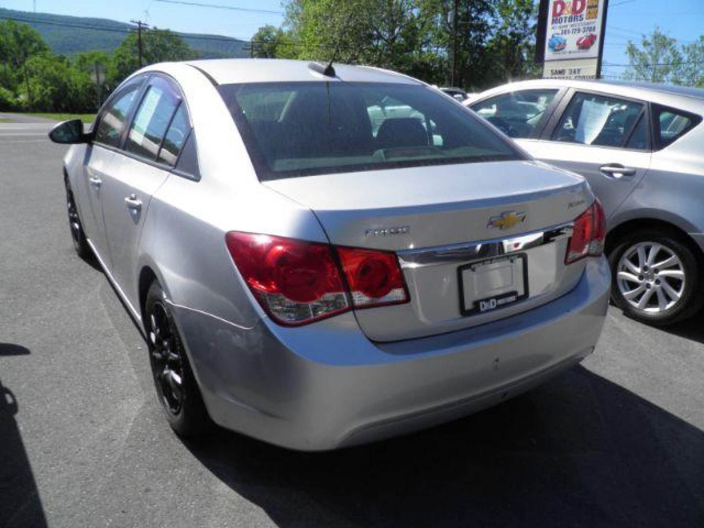 2015 SILVER Chevrolet Cruze LS Auto (1G1PA5SG6F7) with an 1.8L L4 engine, AT transmission, located at 15520 McMullen Hwy SW, Belair, MD, 21502, (301) 729-3700, 39.581375, -78.846451- Photo#4