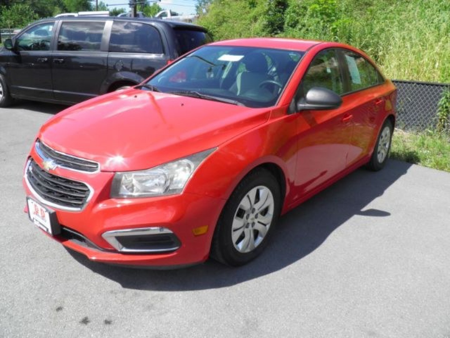 2015 Red Chevrolet Cruze LS Manual (1G1PB5SG9F7) with an 1.8L I4 engine, 6SP transmission, located at 15520 McMullen Hwy SW, Belair, MD, 21502, (301) 729-3700, 39.581375, -78.846451- Photo#0