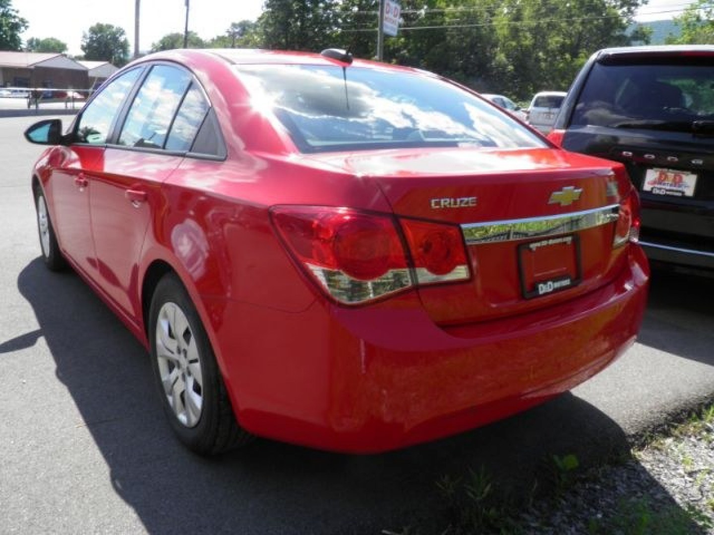 2015 Red Chevrolet Cruze LS Manual (1G1PB5SG9F7) with an 1.8L I4 engine, 6SP transmission, located at 15520 McMullen Hwy SW, Belair, MD, 21502, (301) 729-3700, 39.581375, -78.846451- Photo#4