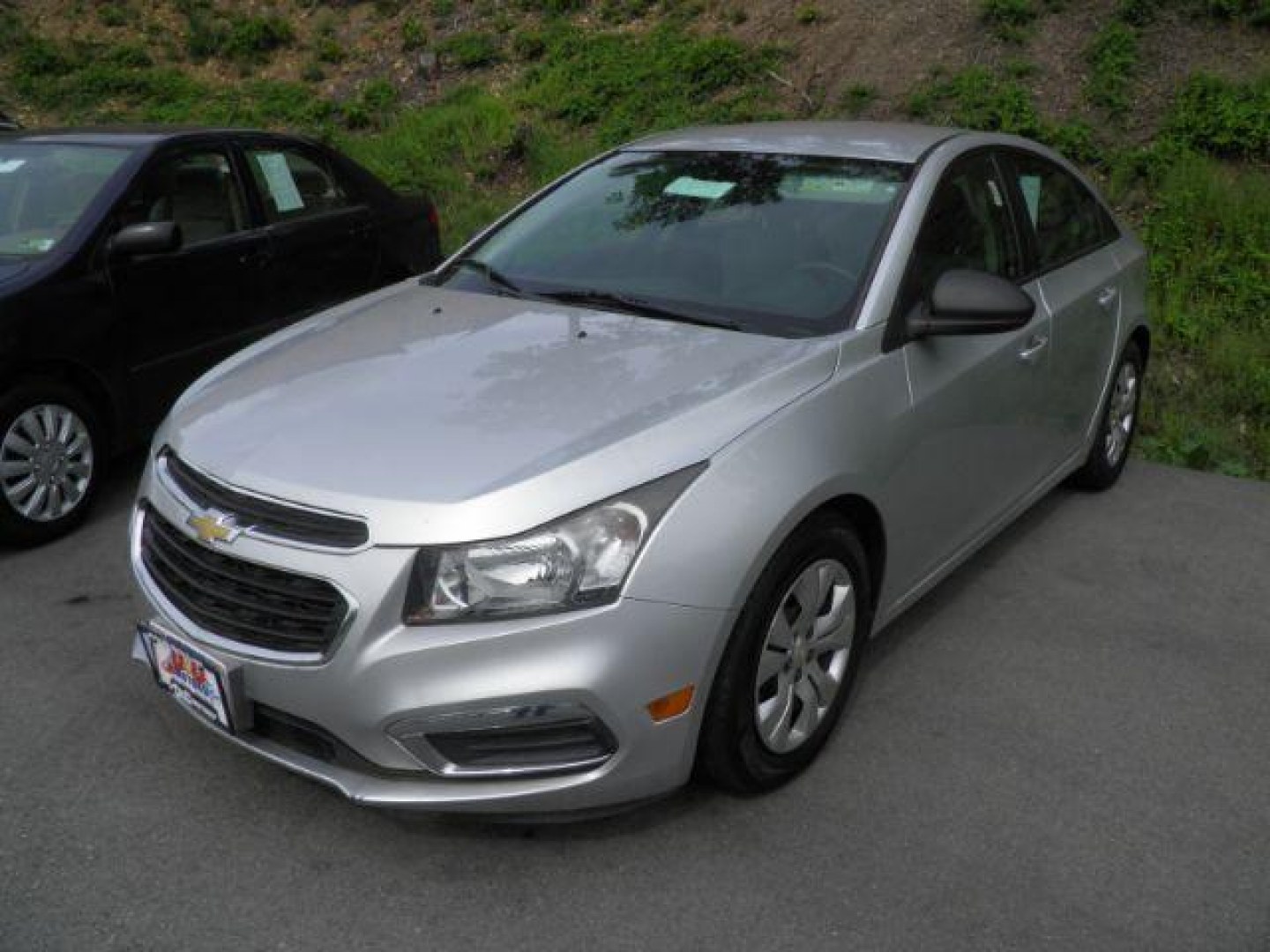 2015 Silver Chevrolet Cruze LS Auto (1G1PA5SG7F7) with an 1.8L I4 engine, AT transmission, located at 15520 McMullen Hwy SW, Belair, MD, 21502, (301) 729-3700, 39.581375, -78.846451 - Photo#0